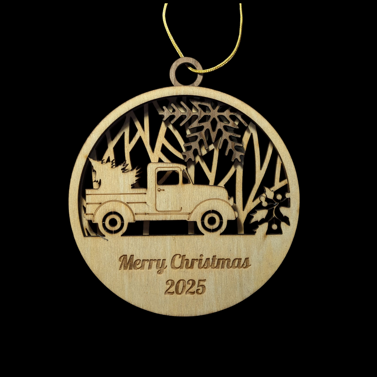Wooden Christmas ornament with a truck and trees design, featuring 'Merry Christmas 2025' text.