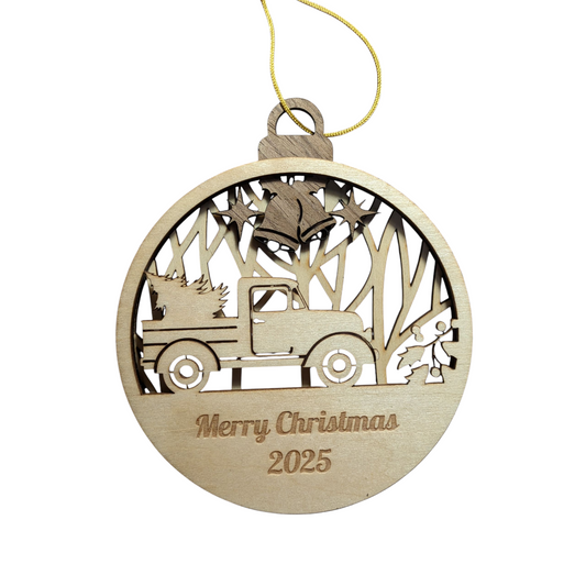 Wooden Christmas ornament with truck and tree design, featuring 'Merry Christmas 2025' text.