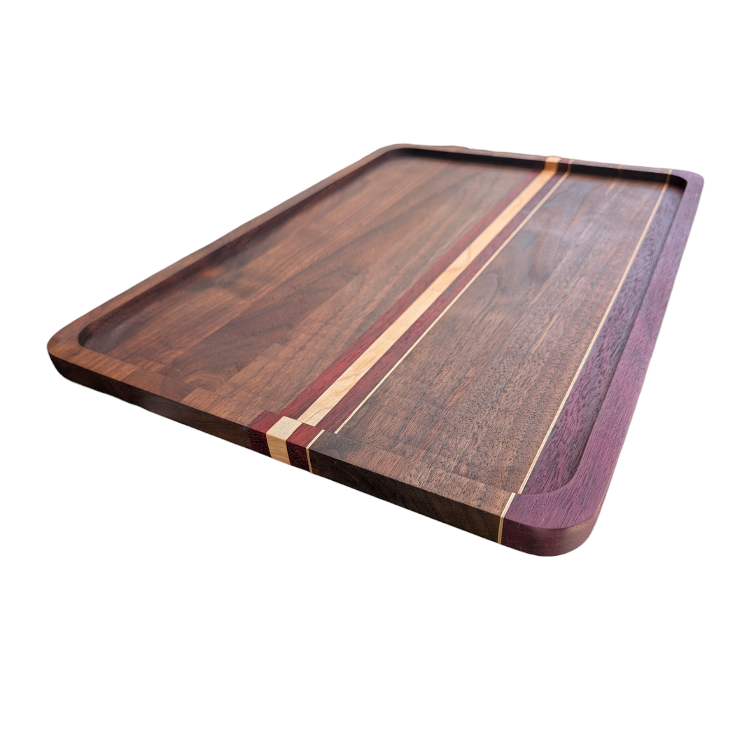 Wooden cutting board with a striped design on a white background